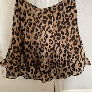 Brown animal print mini skirt. So cute and perfect fall transition